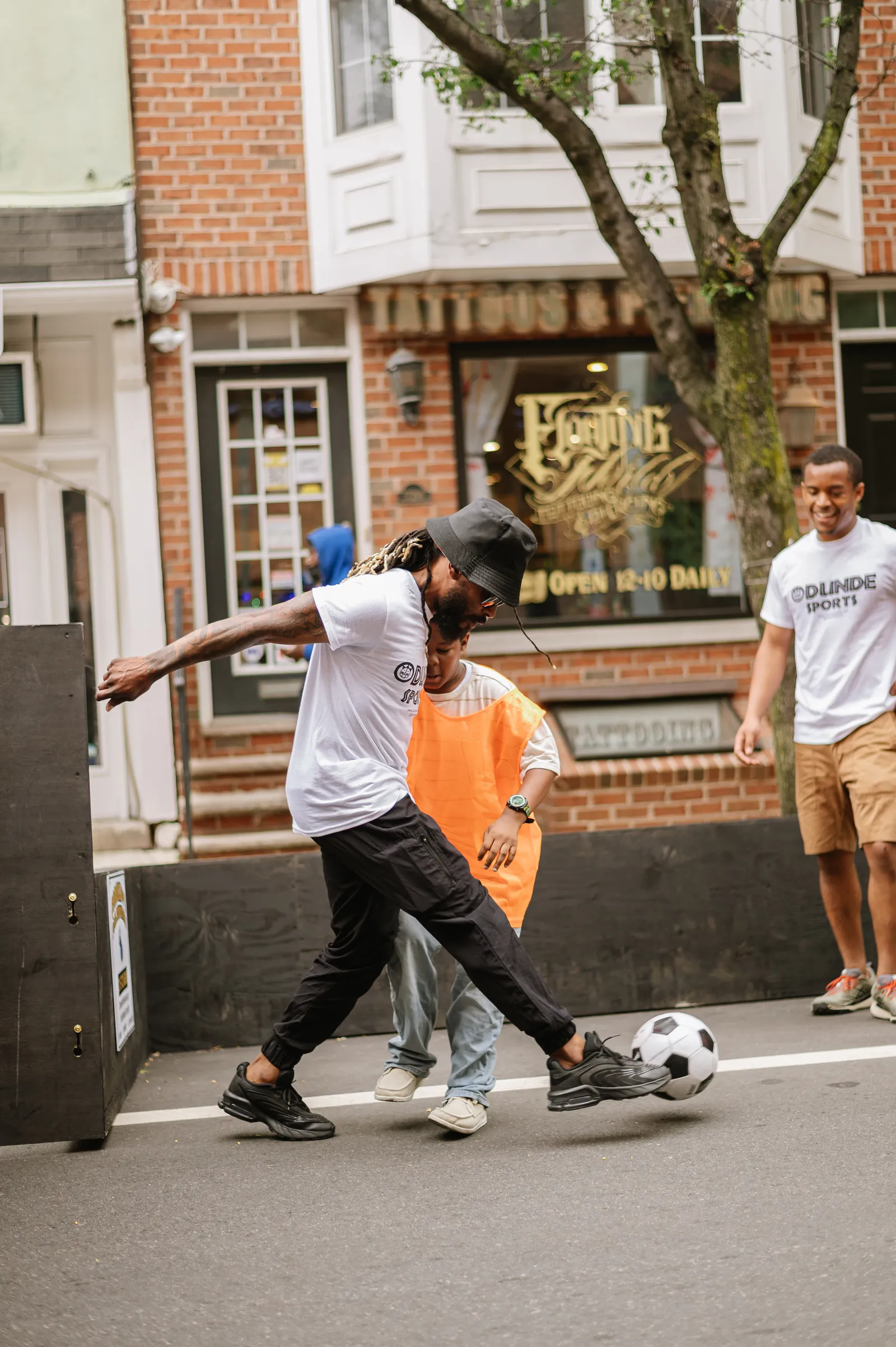 Street soccer action at an ODUNDE Sports event